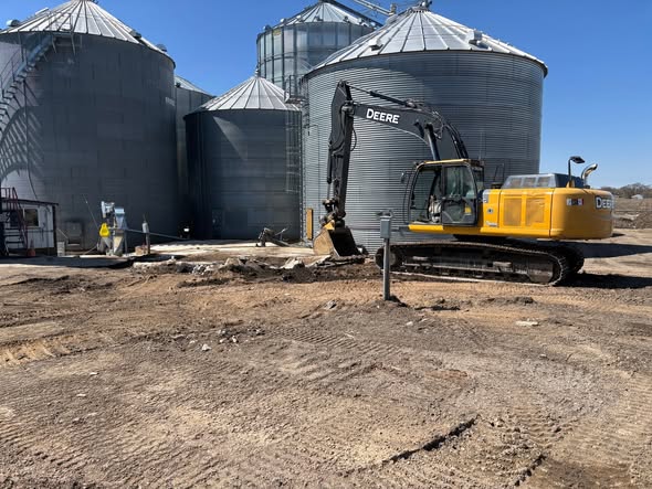 Concrete removal at a grain bin site